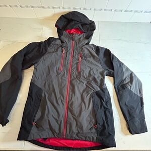 The North Face Red and Black rain Jacket.  Zipper pockets. Hoodie. Flaws.